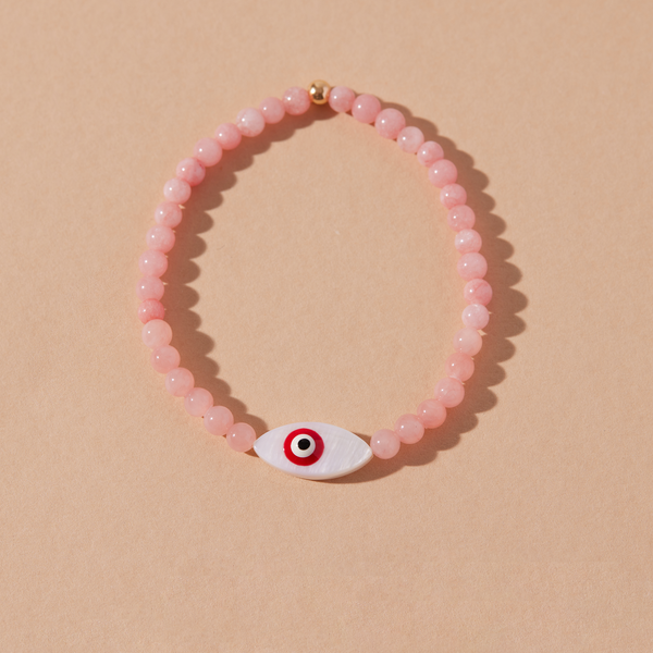 Pink coral deals bracelet evil eye